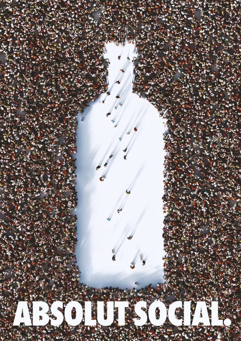 Absolut Social ad: a dense crowd seen from above with a white clearing in the shape of the Absolut bottle, a few people walking into it, and the headline ABSOLUT SOCIAL. in white at the base.