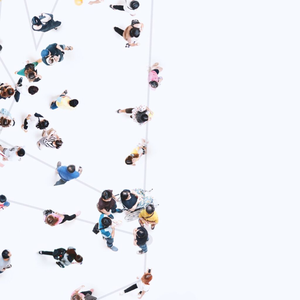 Close-up of the network ad: people of different ages walking and talking, a small group around a person in a wheelchair, thin lines joining them, and a straight line running down the edge of the empty bottle shape.