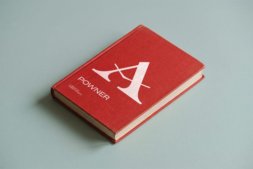 Red clothbound book with a large Powner A and the title POWNER on its cover.