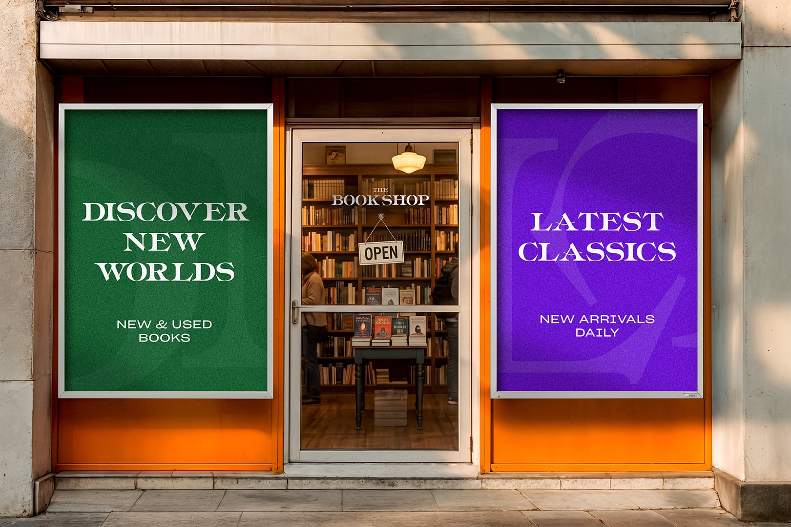 A bookshop window with two posters set in Powner, one green and one purple.