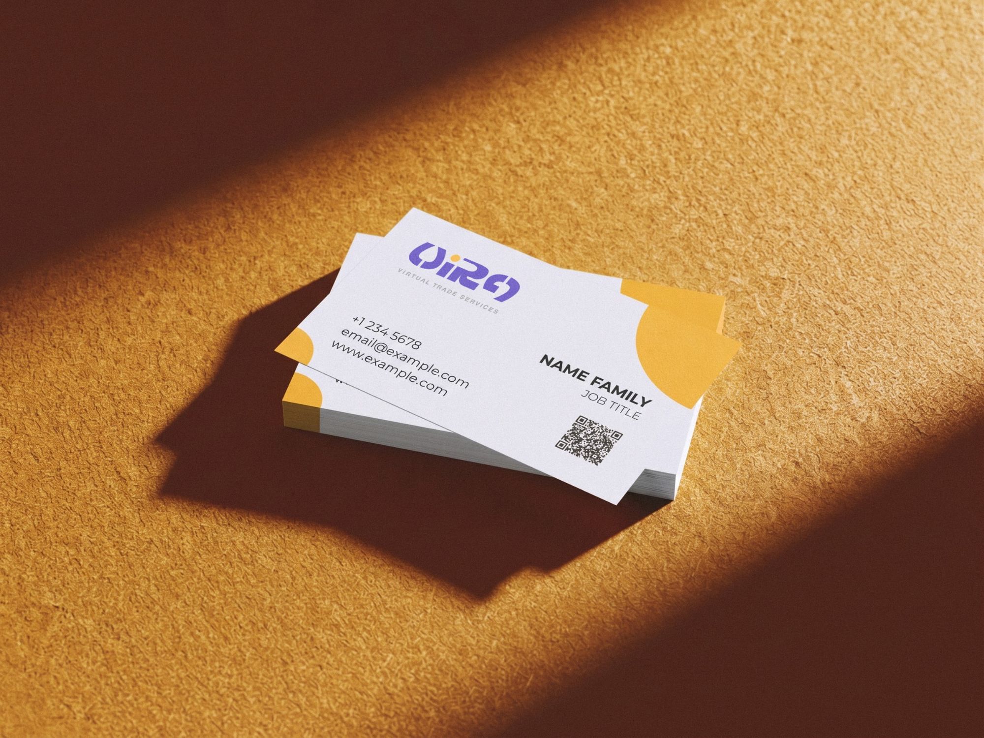 A stack of white Vira business cards on a textured orange surface, with the logo, contact lines, a QR code and gold circles at the corners.