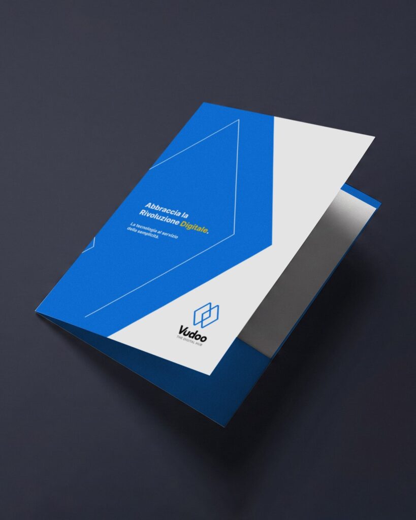 A Vudoo presentation folder in blue and white, its cover reading Abbraccia la Rivoluzione Digitale.